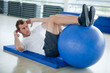 Gym man doing abs