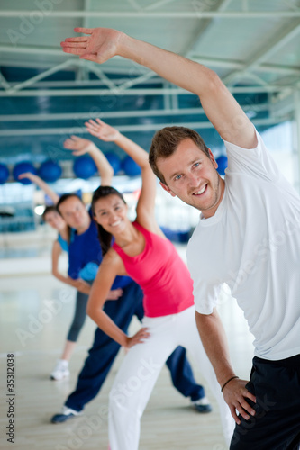 Photo: Gym group exercising Gym group exercising