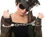 young woman police officer with handcuffs