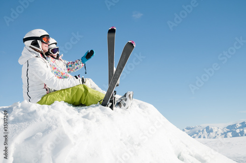 Photo: Skiing - portrait of resting skiers Skiing - portrait of resting skiers