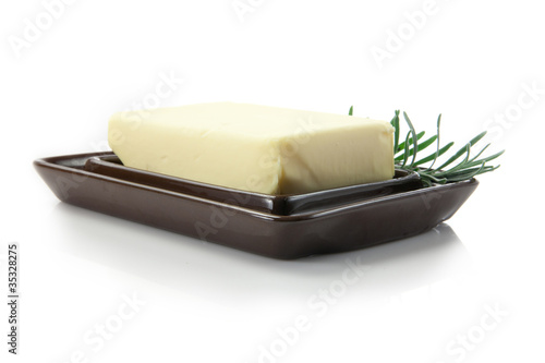Photo: fresh butter with rosemary decoration in butter dish fresh butter with rosemary decoration in butter dish
