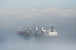 Tankers in the Mist