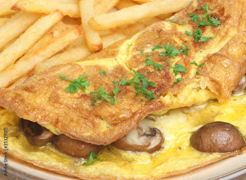 Photo: Mushroom & Cheese Omelet with Fries Mushroom & Cheese Omelet with Fries