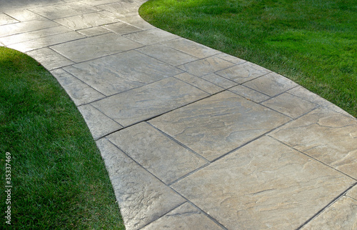Photo: Lawn and paved walkway Lawn and paved walkway