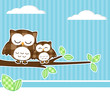 Card with two owls on branch with textile background.