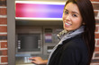 Woman withdrawing cash