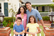 Hispanic family outside home