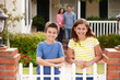 Hispanic family outside home