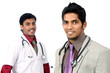 Indian young doctors posing to the camera.