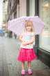 Little girl with umbrella