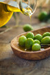 Olive oil with fresh olives