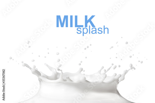 Photo: Milk splash isolated on white Milk splash isolated on white