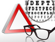Sehtest mit Warnschild und Brille