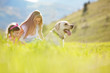 Happy family walking with dog