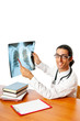 Male doctor looking at x-ray image