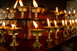 Some rows of candles in Tibetan temple
