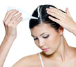 woman dyeing hairs isolated on white