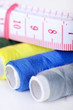 Photo: Thread and measure tape Thread and measure tape