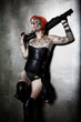 woman armed in cyberpunk style