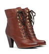 Pair of brown female boots over white