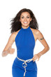 Female happy of her waist measurement showing thumb up sign