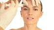 Video: Attractive woman gets botox injection in her face, isolated Attractive woman gets botox injection in her face, isolated