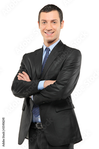 Foto: Portrait of a smiling businessman looking at camera Portrait of a smiling businessman looking at camera