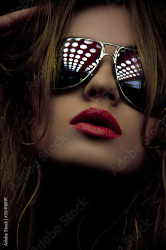 Photo: fashionable woman in shades fashionable woman in shades