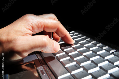 Photo: Working on computer Working on computer