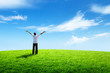 happy young man on green field