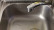 Faucet in kitchen drips