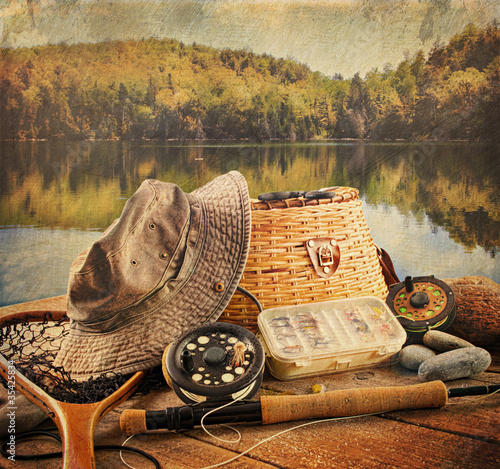 Photo: Fly fishing equipment with vintage look Fly fishing equipment with vintage look