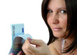 Brunette checking the euro money stock
