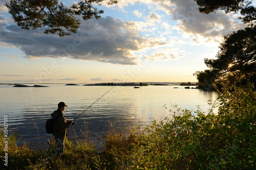 Photo: Evening fishing in the sea Evening fishing in the sea