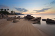 Sunrise at rocky coast of Lamai beach
