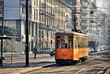 Old vintage orange tram on the street of Milan, Italy Old vintage orange tram on the street of Milan, Italy
