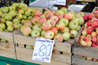 Ripe apples in box on a farm market