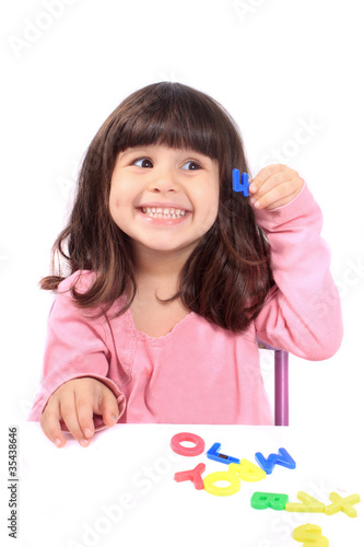 Photo: Girl and letters Girl and letters