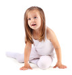 Photo: One beautiful small girl sits on white background. Isolated One beautiful small girl sits on white background. Isolated