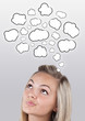 Young girl thinking with clouds