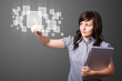 Foto: Businesswoman pressing high tech type of modern buttons Businesswoman pressing high tech type of modern buttons