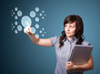 Businesswoman pressing high tech type of modern buttons