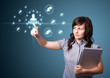 Foto: Businesswoman pressing modern social type of icons Businesswoman pressing modern social type of icons