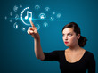 Businesswoman pressing virtual media type of buttons Businesswoman pressing virtual media type of buttons