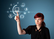 Businesswoman pressing virtual media type of buttons Businesswoman pressing virtual media type of buttons