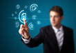 Businessman pressing virtual messaging type of icons Businessman pressing virtual messaging type of icons