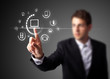 Businessman pressing virtual media type of buttons Businessman pressing virtual media type of buttons