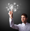 Businessman pressing modern business type of buttons
