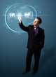 Businessman pressing high tech type of modern buttons