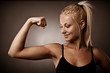 Woman flexing her biceps